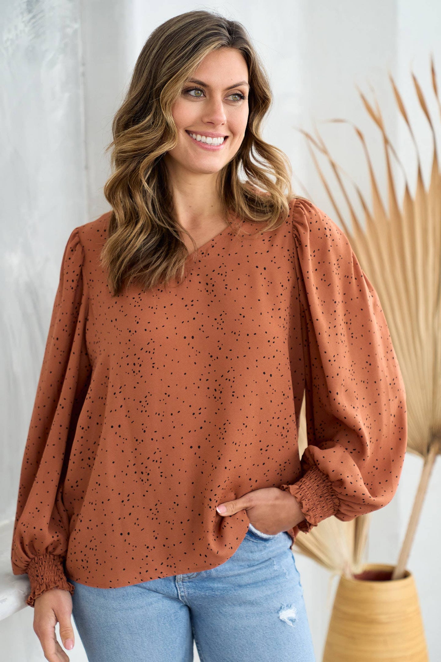 V neck ruffle and smocked puff detailed blouse