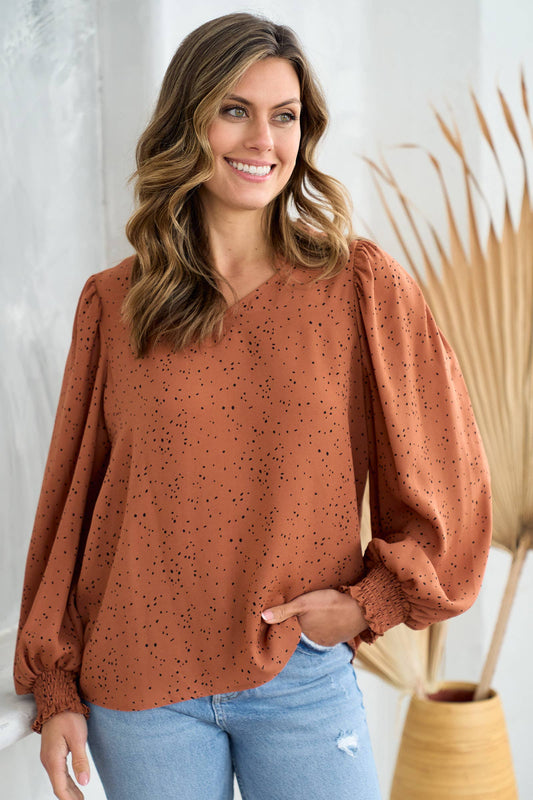 V neck ruffle and smocked puff detailed blouse