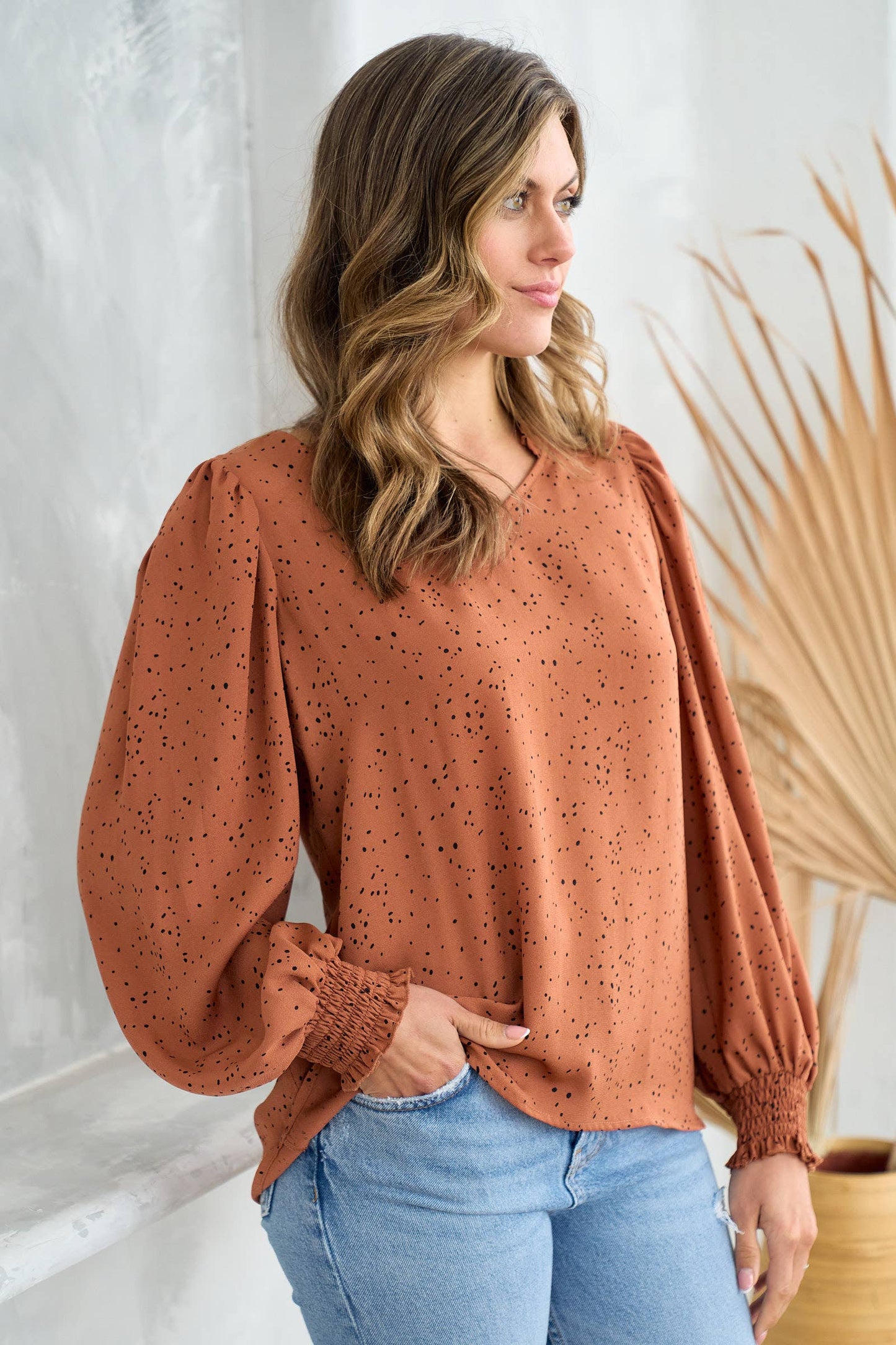 V neck ruffle and smocked puff detailed blouse