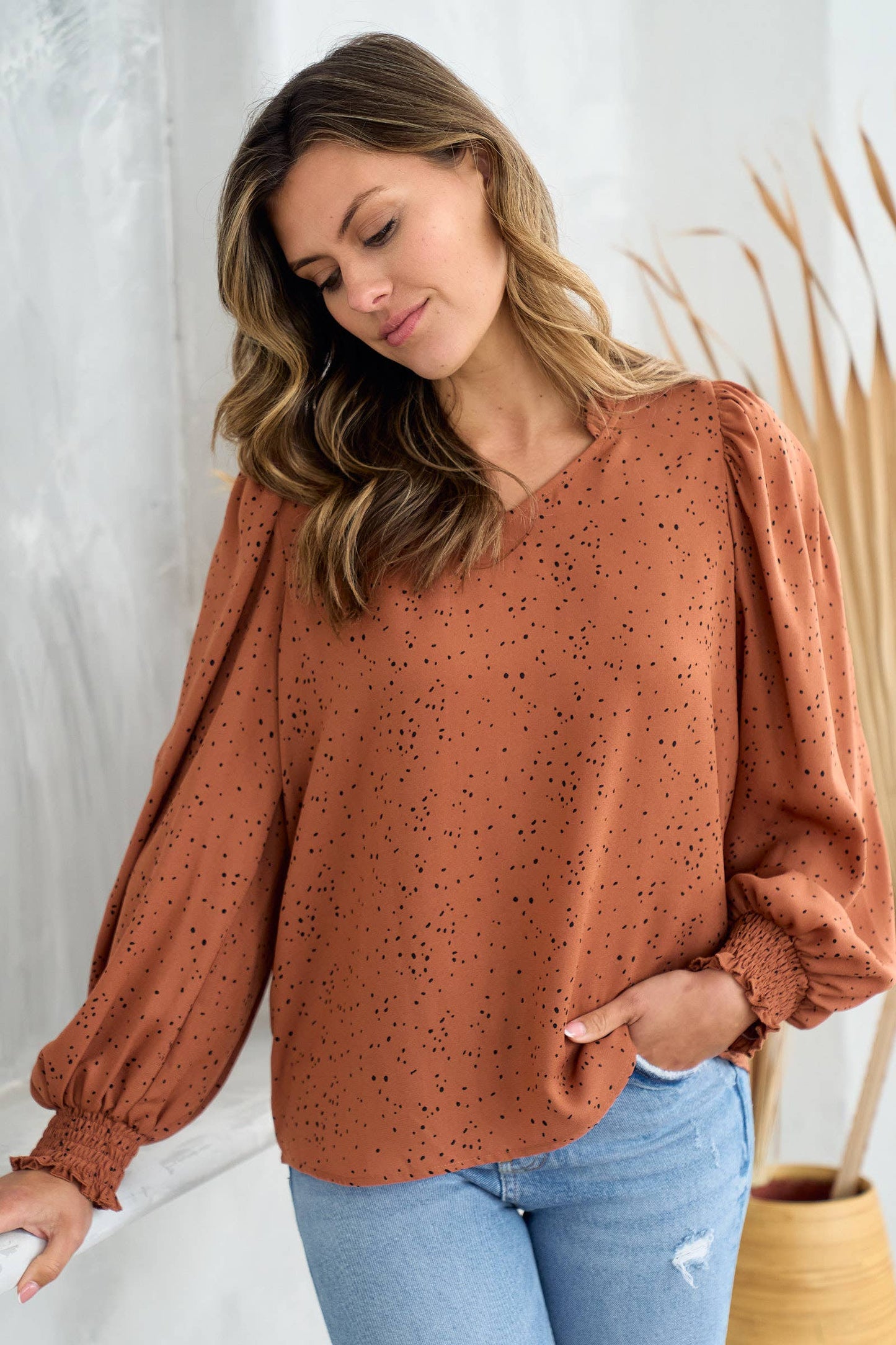 V neck ruffle and smocked puff detailed blouse