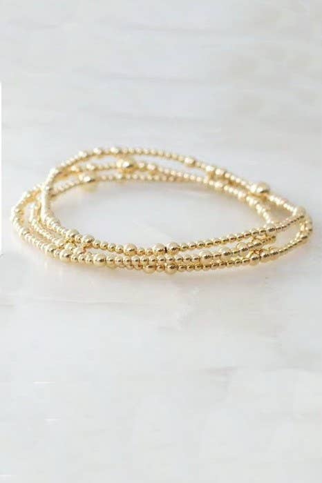 MULTI LAYER GOLD BEADED BRACELET