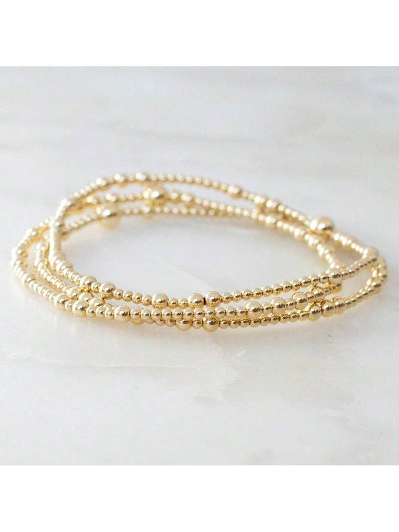 MULTI LAYER GOLD BEADED BRACELET