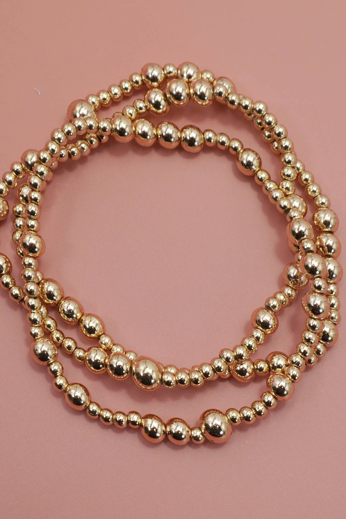 MULTI LAYER GOLD BEADED BRACELET