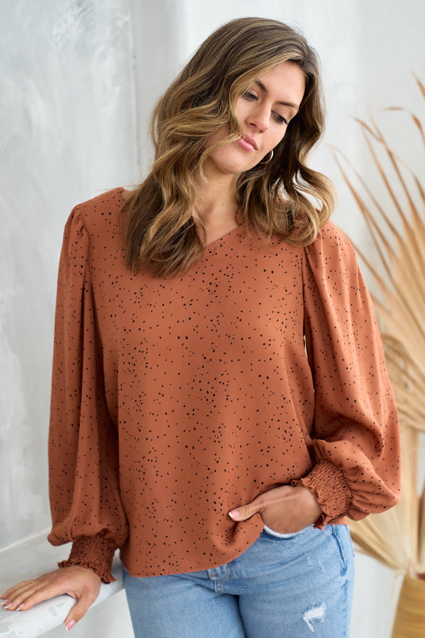 V neck ruffle and smocked puff detailed blouse